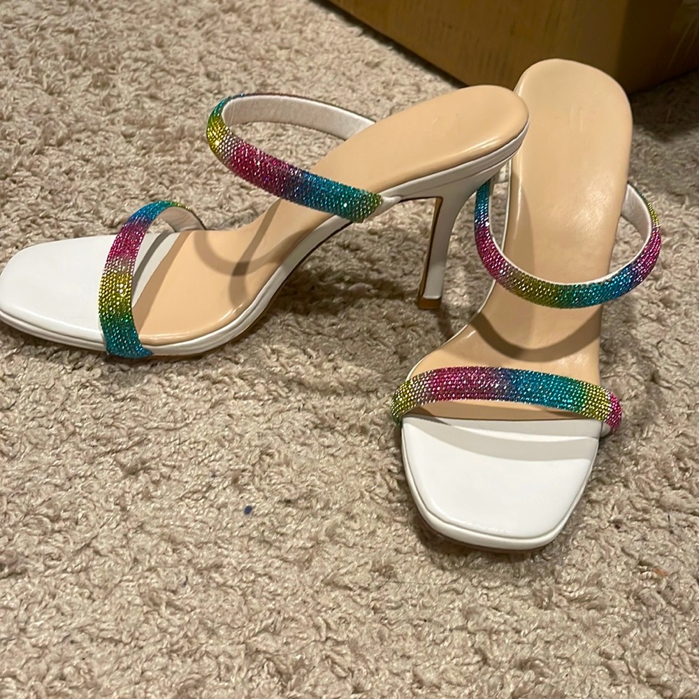 White heels with rainbow accents